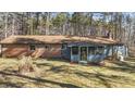 This lovely home features a brick exterior, a screened porch, and a spacious backyard at 8172 S Shoreview Dr, Trafalgar, IN 46181