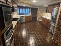 Updated kitchen featuring modern stainless steel appliances and ample counter space at 10610 Stormhaven Way, Indianapolis, IN 46256