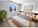 Cozy bedroom with a large window, stylish lamps, and a comfortable bed topped with decorative pillows at 2365 Grand Fir Dr, Greenwood, IN 46143