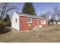 Quaint home featuring a combination of brick and white siding, offering a cozy curb appeal at 3044 S Keystone Ave, Indianapolis, IN 46237