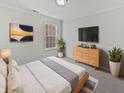Serene main bedroom with soft lighting, modern decor, a large window, and a comfortable bed at 3153 Underwood Dr, Whiteland, IN 46184