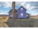 Inviting home with a classic design, showcasing its lovely blue siding and well-maintained landscaping at 4844 N 700 W, McCordsville, IN 46055