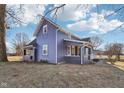 Charming two-story home with eye-catching blue siding and covered porches, perfect for enjoying the outdoors at 4844 N 700 W, McCordsville, IN 46055