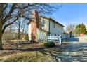 A beautiful exterior view, complete with mature trees and fenced in backyard at 724 E 199Th St, Westfield, IN 46074