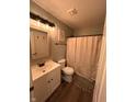 Cozy bathroom with a vanity, framed mirror, toilet, and bathtub with a neutral shower curtain at 12145 Bubbling Brook Dr # 600, Fishers, IN 46038