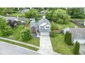 Aerial view of a home with a spacious yard and mature trees in a Gathering-friendly neighborhood at 12612 Clearview Ln, Indianapolis, IN 46236