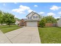 Charming two-story home with a well-manicured lawn and inviting curb appeal at 12612 Clearview Ln, Indianapolis, IN 46236