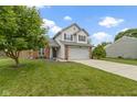 Charming two-story home with a well-manicured lawn and inviting curb appeal at 12612 Clearview Ln, Indianapolis, IN 46236