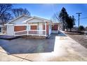 Charming rear exterior with a small covered porch and well-maintained yard at 493 N Avon Ave, Avon, IN 46123
