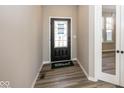 Entryway showcasing stylish flooring and neutral paint at 6323 Willow Branch Way, Plainfield, IN 46168