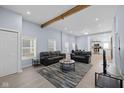 Bright and spacious living room with hardwood floors, modern furniture, and great natural light at 721 E Morris St, Indianapolis, IN 46203
