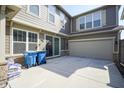 Residential home exterior with a spacious backyard, a two-car garage, with an ample parking area, and lots of natural light at 7228 Broadacre Ct, Carmel, IN 46033
