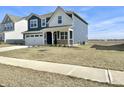 Charming home with a well-maintained lawn, brick accents, and a two-car garage at 8626 Jeff Cir, Brownsburg, IN 46112