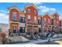 Townhome complex with beautiful brick exterior, and private entrances at 1074 Reserve Way, Indianapolis, IN 46220