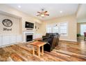 Bright living room features a fireplace, built-in cabinets, and plenty of natural light at 15506 Slateford Rd, Noblesville, IN 46062