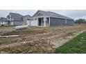 Single-story home featuring a two-car garage and a side entrance, set in a construction phase lot at 2254 Oakmont Dr, Plainfield, IN 46168