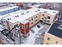 Aerial view of the apartment building, showcasing the architecture and balconies at 233 E St Joseph St # 3H, Indianapolis, IN 46202