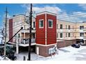 View of the side of the building with balconies, and electrical lines overhead at 233 E St Joseph St # 3H, Indianapolis, IN 46202