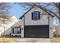 Inviting two-story house showcasing a clean design with a spacious two-car garage at 2361 Salem Park Ct, Indianapolis, IN 46239