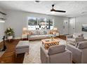 Bright living room featuring hardwood floors, recessed lights and a large window for natural light at 3025 E 6Th St, Anderson, IN 46012