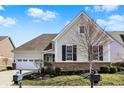 Home with a landscaped yard, sidewalk and driveway, and craftsman style exterior at 3331 Adare Cir, Westfield, IN 46062