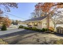 Charming home with a well-manicured lawn, covered porch, and private driveway at 7780 Paw Paw Dr, Nineveh, IN 46164