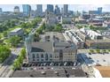 An aerial view shows the property in a vibrant downtown location, near other apartments and businesses at 802 N Meridian St # 204, Indianapolis, IN 46204