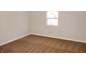 Clean bedroom with neutral carpet and freshly painted walls at 1149 W 28Th St, Indianapolis, IN 46208