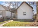 This home has neutral siding and a covered entryway at 1149 W 28Th St, Indianapolis, IN 46208
