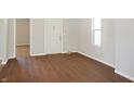 Inviting living room with new hardwood floors and freshly painted walls at 1149 W 28Th St, Indianapolis, IN 46208