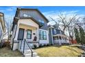 Attractive two-story house with a covered front porch, set in a neighborhood setting at 1603 Nowland Ave, Indianapolis, IN 46201