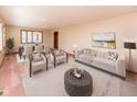 Living room and dining room with neutral tones, plush seating, and ample natural light at 154 Dover N Blvd, Brownsburg, IN 46112