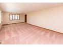 Large living room featuring a spacious open layout, with large windows at 154 Dover N Blvd, Brownsburg, IN 46112