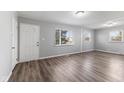 Spacious living room with wood-look floors and plenty of natural light at 2315 Caldwell Pl, Columbus, IN 47201