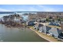 Waterfront home featuring a boat slip with stunning views of the open water at 12561 Marina View Dr, Indianapolis, IN 46256