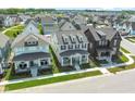 Aerial view of a neighborhood featuring well-maintained homes and landscaped yards at 15304 Fairlands Dr, Westfield, IN 46074