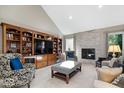 Spacious living room with custom built-ins and a cozy fireplace feature at 1621 Rosebud Ln, Greenwood, IN 46143