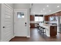 Open-concept kitchen showcasing an island with barstool seating and modern design at 181 Cline St, Westfield, IN 46074