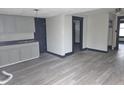 Neutral walls compliment the light-gray cabinets and dark countertop at 238 S Temple Ave, Indianapolis, IN 46201