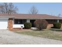 Beautiful brick ranch with a well-maintained front yard and lovely landscaping at 5582 E State Road 144, Mooresville, IN 46158