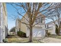Charming two-story home featuring a two-car garage and well-maintained landscaping at 6663 Black Antler Cir, Indianapolis, IN 46217