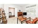 Neutral bedroom with a large window, carpeted floors, and desk at 698 Ridge Gate Dr, Brownsburg, IN 46112