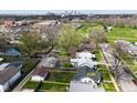 Aerial view of the neighborhood featuring a charming home with a well-maintained lawn and mature trees at 2528 S New Jersey St, Indianapolis, IN 46225
