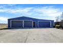 Spacious three-car garage with ample parking space, ideal for car enthusiasts or extra storage at 15415 E 146Th St, Noblesville, IN 46060