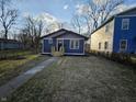 Charming single-story home with freshly painted siding and a well-manicured lawn at 3262 Orchard Ave, Indianapolis, IN 46218