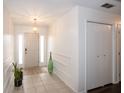 Bright foyer with ceramic tile flooring, complemented by decorative accents and fresh white walls at 3335 Woodcrest Ct, Columbus, IN 47203