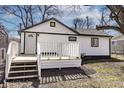 Backyard view showcasing the back entrance, porch and outdoor space at 7252 E 47Th St, Indianapolis, IN 46226