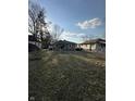 Modest single Gathering home featuring charming covered porch and front yard at 340 N Eaton Ave, Indianapolis, IN 46219