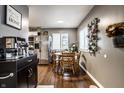 Cozy dining area adjacent to the kitchen, perfect for Gathering meals, with lovely decor at 3867 Asbury St, Indianapolis, IN 46227