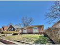 Quaint brick home with tidy landscaping and a classic design, set in a friendly neighborhood at 75 S 11Th Ave, Beech Grove, IN 46107